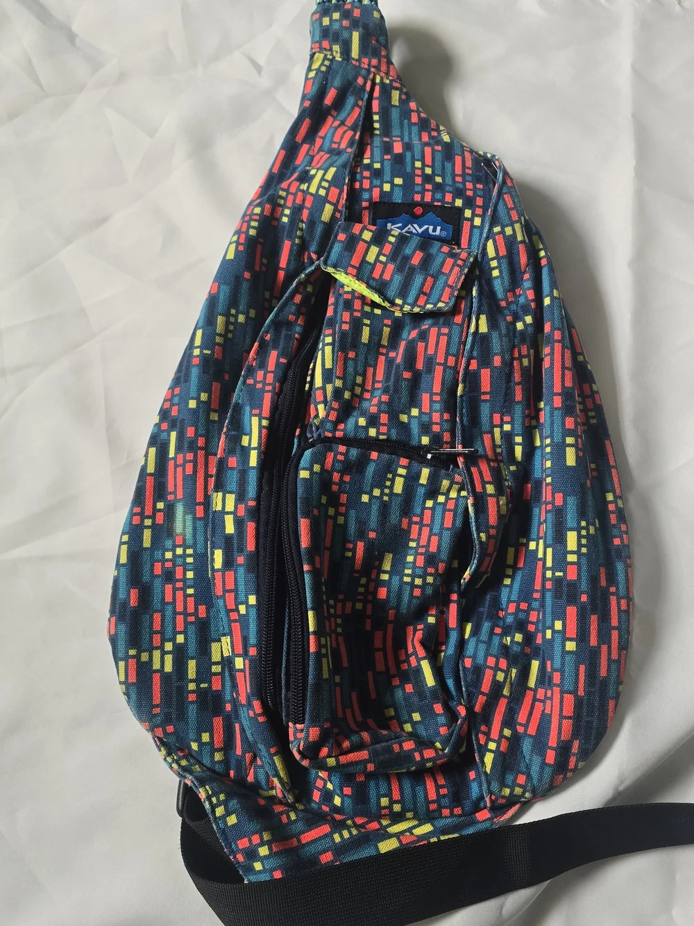 Kavu Teal Crossbody Sling Bag with Red and Yellow Geo Print - Picture 1 of 2